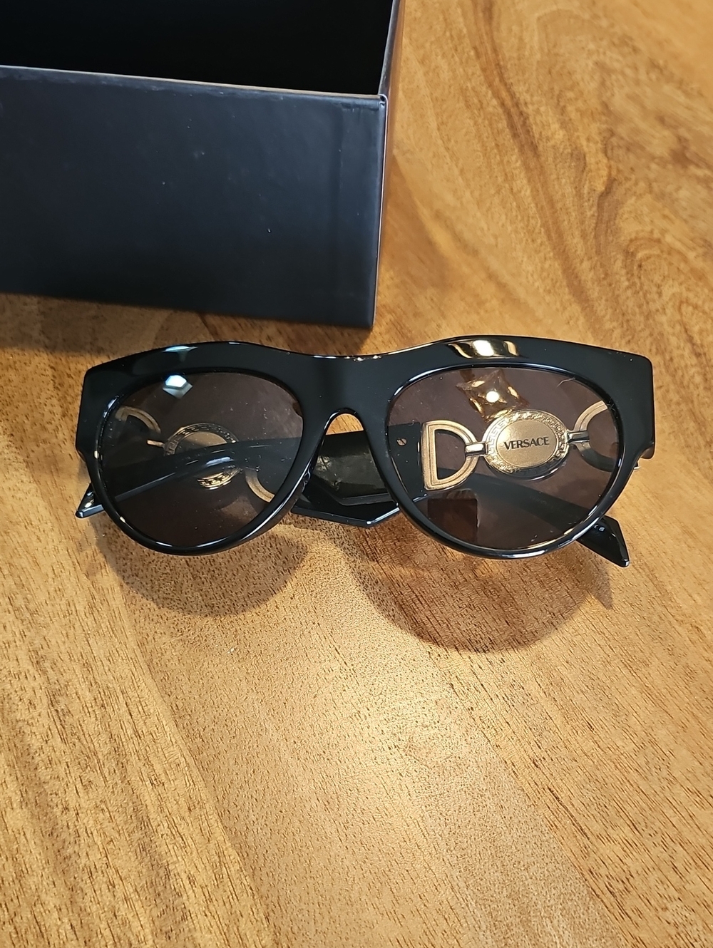 Versace Black Cat-Eye Sunglasses with Gold Medallion Detail